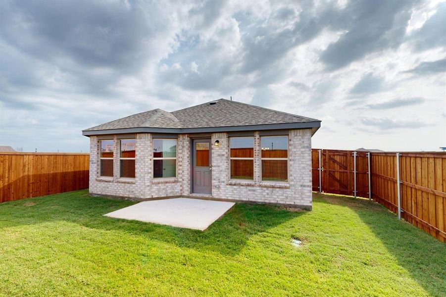 Exterior details and patio area of a home in Mobberly Farms, Pilot Point (Image 3). Exterior details and patio area of a home in Mobberly Farms, Pilot Point (Image 3).