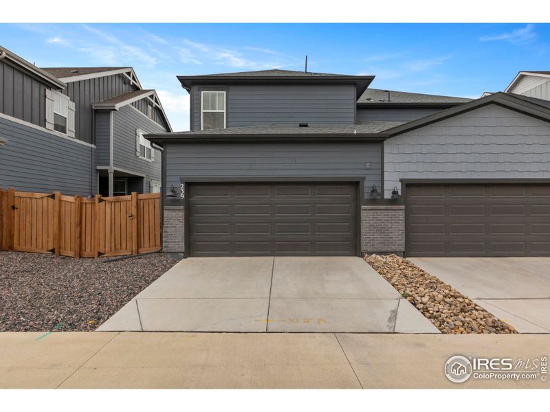 Front exterior of a new home in , Berthoud, CO, highlighting curb appeal (Image 2). Front exterior of a new home in , Berthoud, CO, highlighting curb appeal (Image 2).