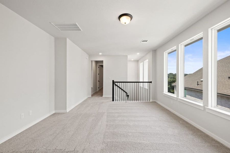 Spacious, unfurnished interior of a new home in Lariat, Liberty Hill (Image 45).