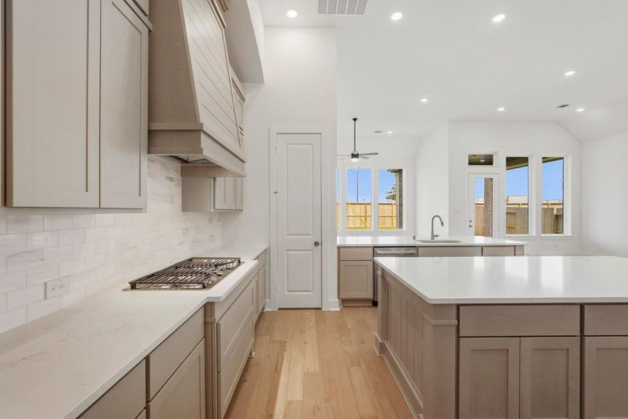 Kitchen features a gas cooktop, pot & pan drawers along with a double oven!