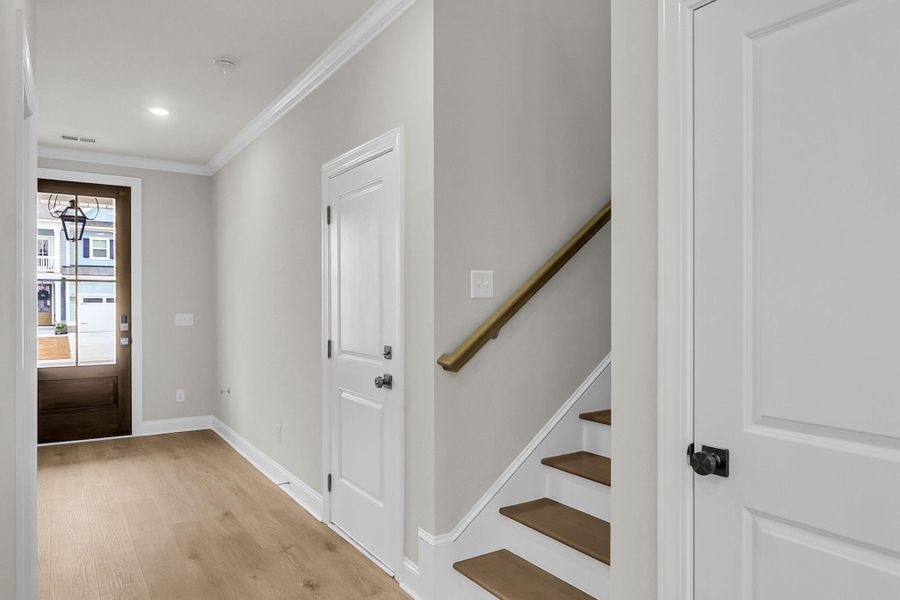 Spacious, unfurnished interior of a new home in Tidewater at Lakes of Cane Bay, Summerville (Image 30).