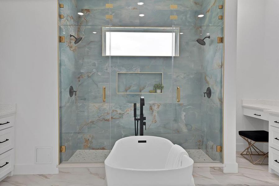 Freestanding soaking tub with a walk-in shower featuring a window, dual showerheads, and integrated shelving