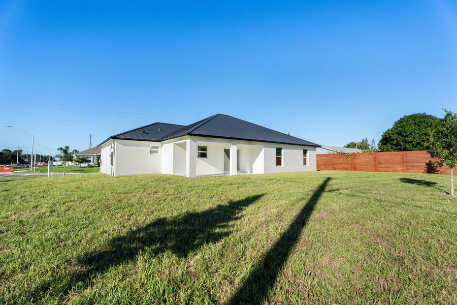 Exterior details and patio area of a home in , Port St. Lucie (Image 3). Exterior details and patio area of a home in , Port St. Lucie (Image 3).