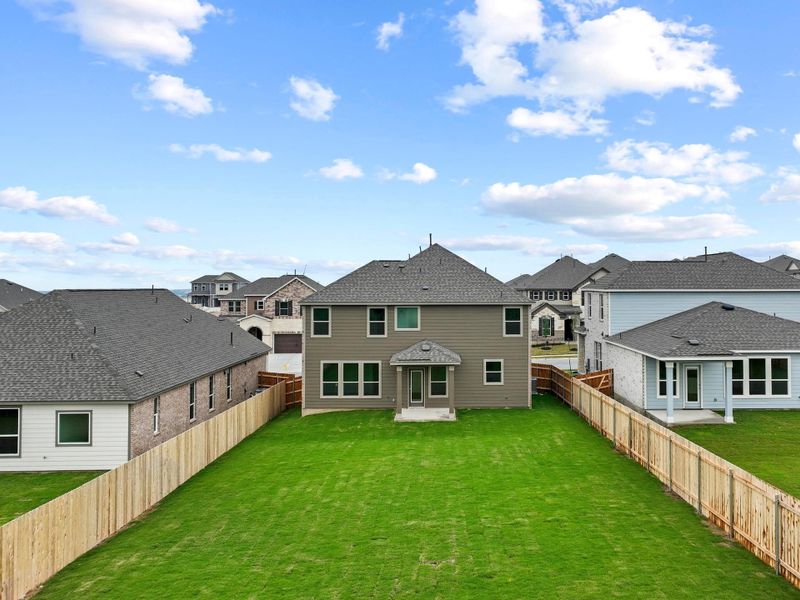 Front exterior of a new home in Salerno - Classic Collection, Round Rock, TX, highlighting curb appeal (Image 2). Front exterior of a new home in Salerno - Classic Collection, Round Rock, TX, highlighting curb appeal (Image 2).