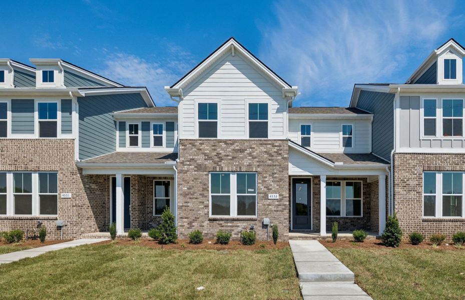 Front exterior of a new home in Bradshaw Farms Reserve, Mount Juliet, TN, highlighting curb appeal (Image 20). Front exterior of a new home in Bradshaw Farms Reserve, Mount Juliet, TN, highlighting curb appeal (Image 20).