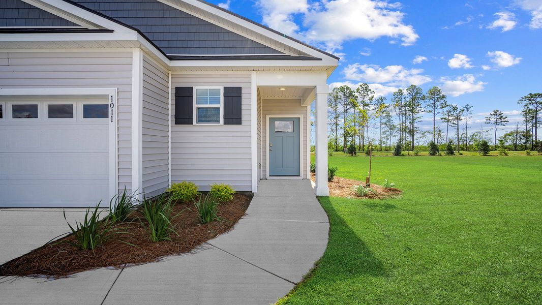 Exterior details and patio area of a home in The Lakes at North Glynn, Brunswick (Image 2).
