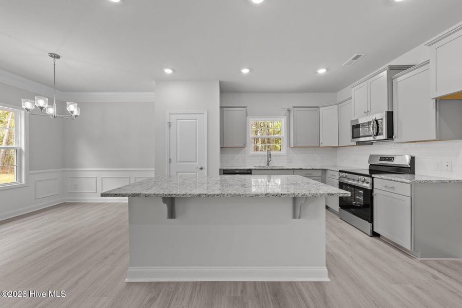 Furnished interior view inside a new home in Wood Creek, Leland (Image 4). Furnished interior view inside a new home in Wood Creek, Leland (Image 4).
