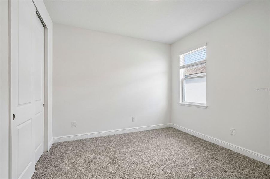 Spacious, unfurnished interior of a new home in Legends Preserve - Signature Series, Daytona Beach (Image 19).