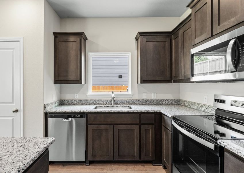 The kitchen has a large window that lets in great, natural light. The kitchen has a large window that lets in great, natural light.