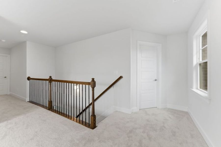 Representative unfurnished interior of a home built from the Fairfield Lux by Keystone Homes NC in Weybridge, Burlington (Image 79).