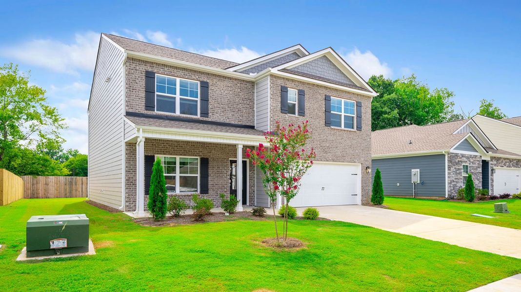 Front exterior of a new home in Fairview Hills, Cleveland, TN, highlighting curb appeal (Image 18).