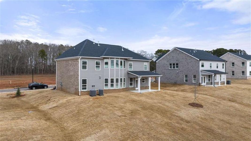 Exterior details and patio area of a home in The Gates at Pates Creek, Hampton (Image 3).