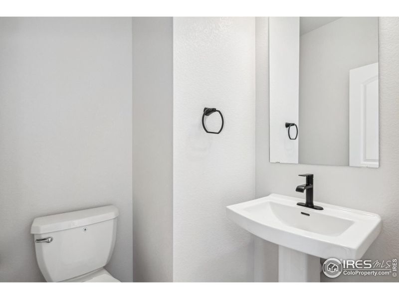 Furnished interior view inside a new home in Kinston Mainstreet Townhomes, Loveland (Image 13).