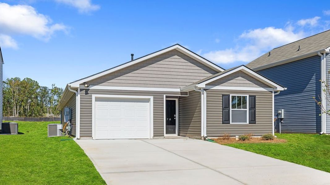 Front exterior of a new home in Varner Station, Woodruff, SC, highlighting curb appeal (Image 1). Front exterior of a new home in Varner Station, Woodruff, SC, highlighting curb appeal (Image 1).