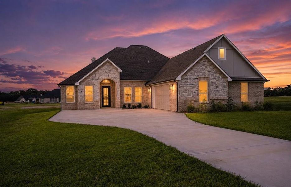 Front exterior of a new home in , Corsicana, TX, highlighting curb appeal (Image 2). Front exterior of a new home in , Corsicana, TX, highlighting curb appeal (Image 2).
