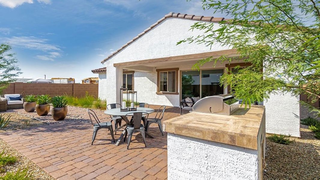 Representative exterior photo of a completed home built from the 40R1 by Taylor Morrison in Los Cielos at Rancho Mercado, Surprise, AZ (Image 25). Representative exterior photo of a completed home built from the 40R1 by Taylor Morrison in Los Cielos at Rancho Mercado, Surprise, AZ (Image 25).