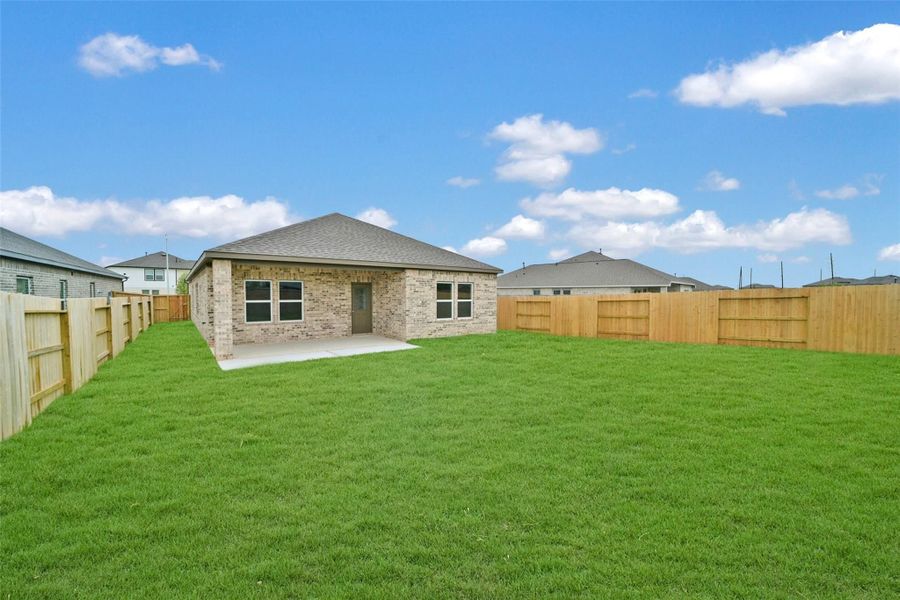 Front exterior of a new home in Sunterra, Katy, TX, highlighting curb appeal (Image 133). Front exterior of a new home in Sunterra, Katy, TX, highlighting curb appeal (Image 133).