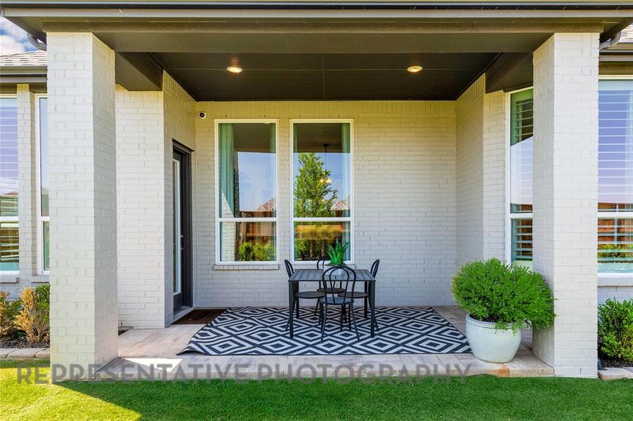 Exterior details and patio area of a home in Tavolo Park, Fort Worth (Image 23).