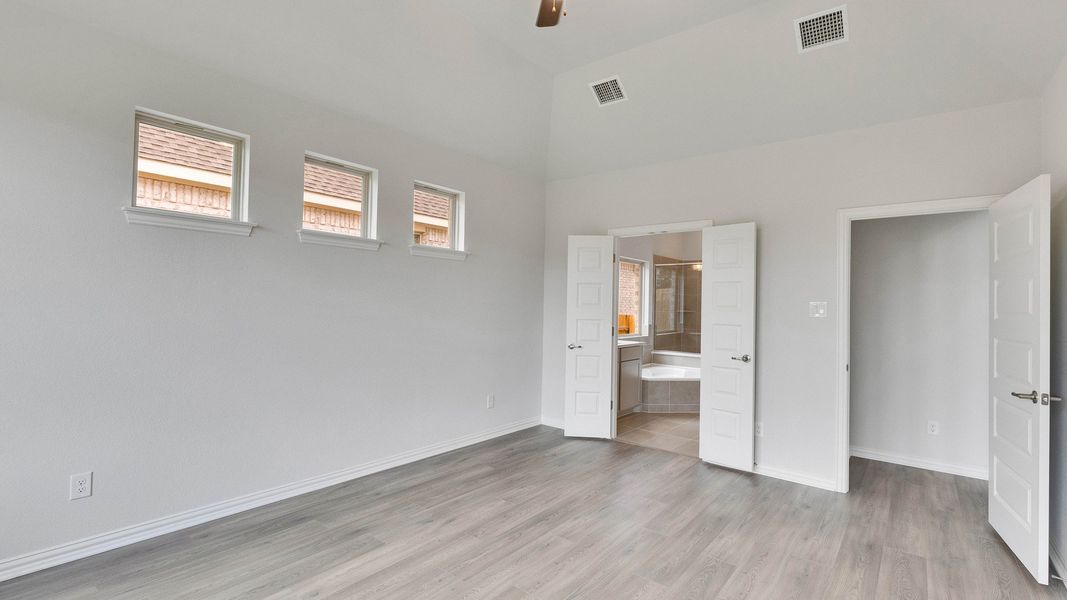 Furnished interior view inside a new home in Oaks at San Gabriel, Georgetown (Image 20).