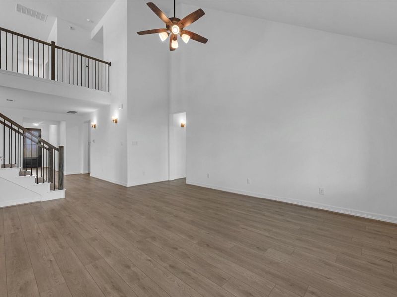 Spacious, unfurnished interior of a new home in Sunterra, Katy (Image 25).