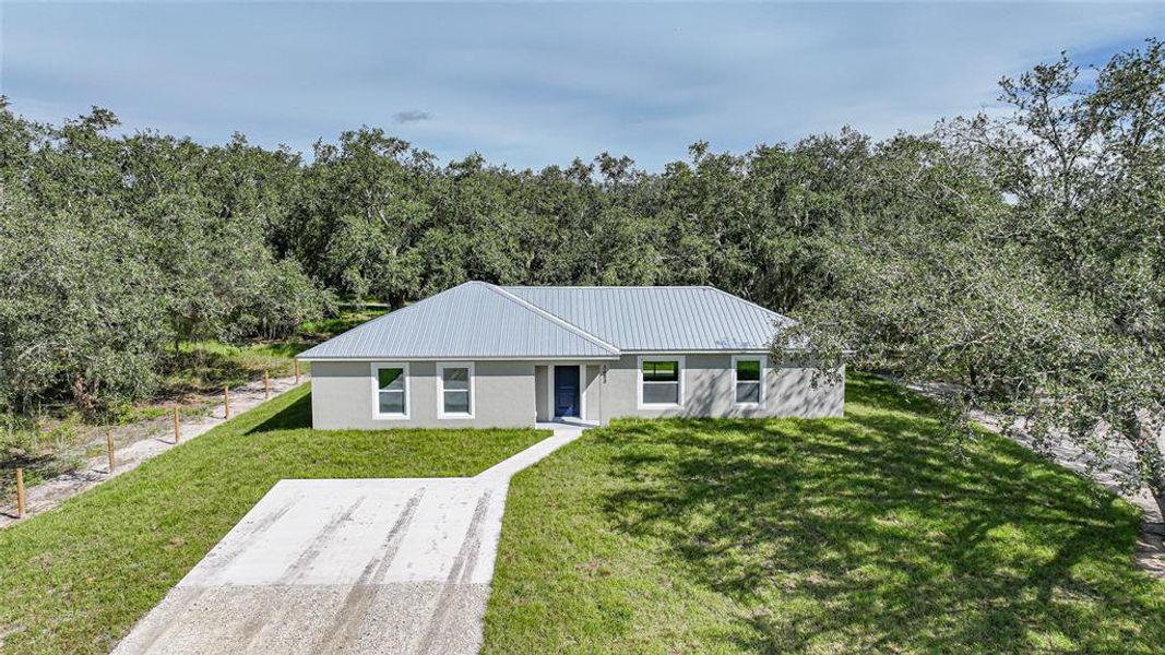 Front exterior of a new home in , Arcadia, FL, highlighting curb appeal (Image 1). Front exterior of a new home in , Arcadia, FL, highlighting curb appeal (Image 1).