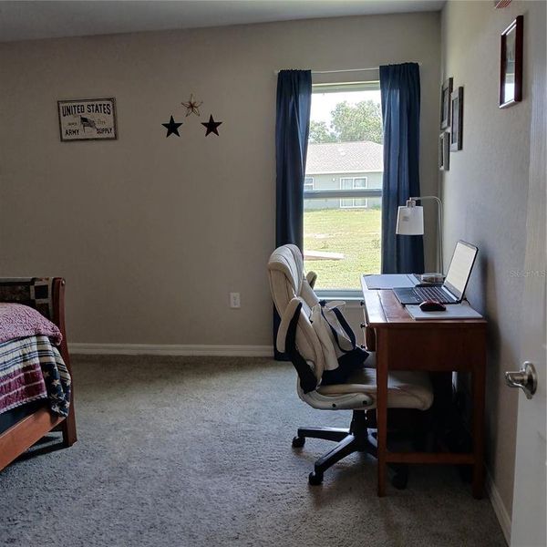Furnished interior view inside a new home in , Dunnellon (Image 31).