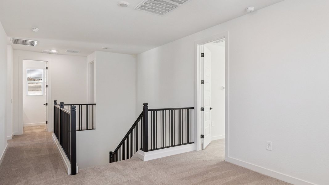 Representative unfurnished interior of a home built from the Crow by D.R. Horton in The Ridge at Stone Butte, Phoenix (Image 33).