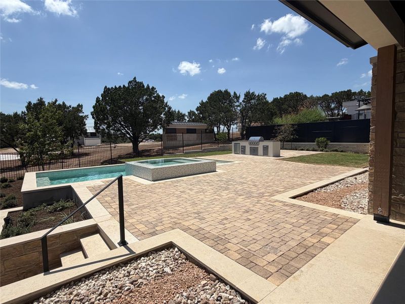 Exterior details and patio area of a home in The Overlook at Westlake, Austin (Image 4).