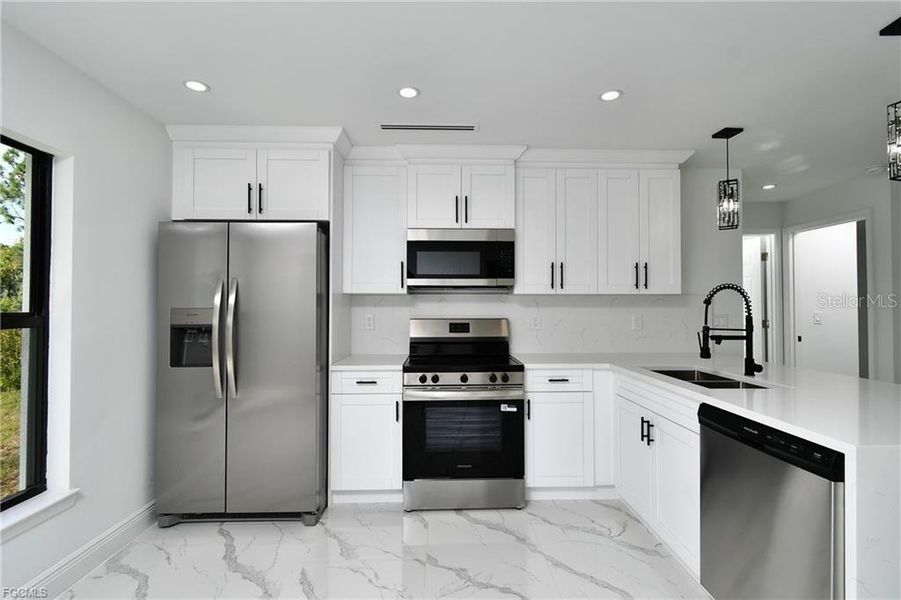 Furnished interior view inside a new home in , Lehigh Acres (Image 7). Furnished interior view inside a new home in , Lehigh Acres (Image 7).