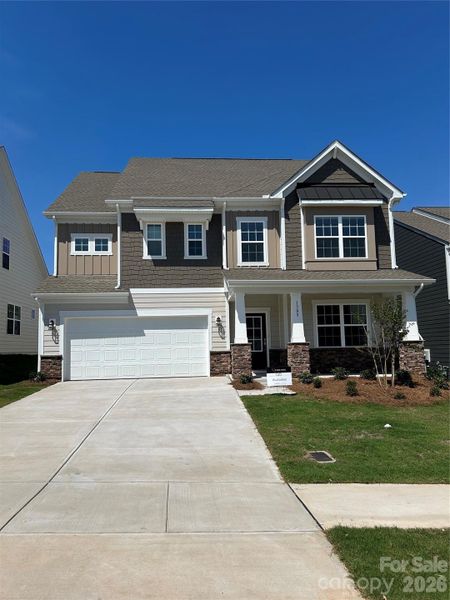 Front exterior of a new home in Redhawk, Belmont, NC, highlighting curb appeal (Image 2). Front exterior of a new home in Redhawk, Belmont, NC, highlighting curb appeal (Image 2).