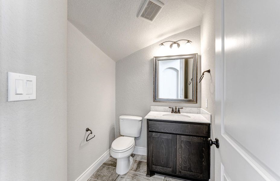 Furnished interior view inside a new home in Bridgeland 60′, Cypress (Image 16).