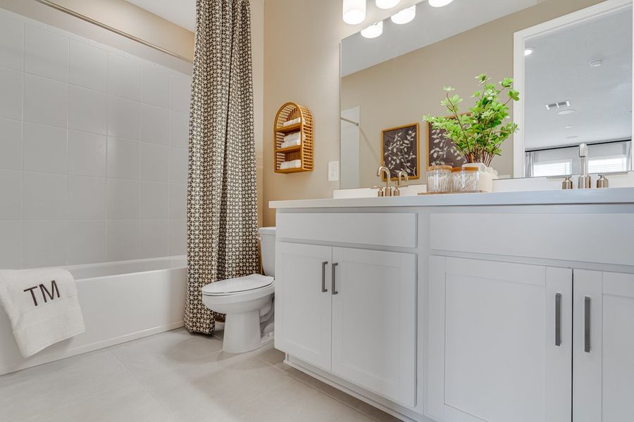 Furnished interior view inside a new home in Center Lake Ranch Community Group Page, St. Cloud (Image 29).