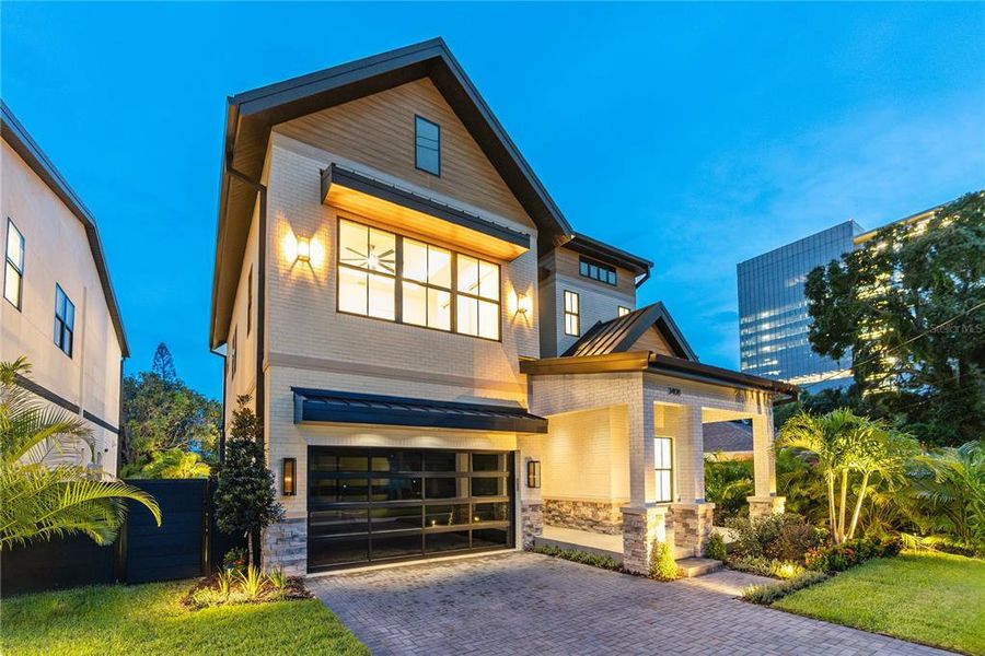Front exterior of a new home in , Tampa, FL, highlighting curb appeal (Image 1). Front exterior of a new home in , Tampa, FL, highlighting curb appeal (Image 1).