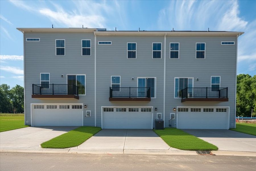 Front exterior of a new home in Stowe Branch Townhomes, Charlotte, NC, highlighting curb appeal (Image 2).