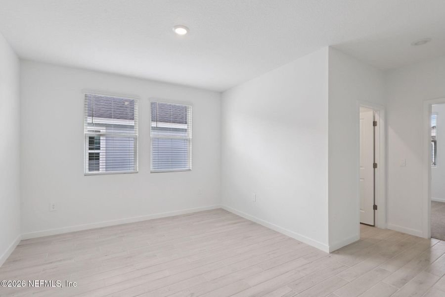 Spacious, unfurnished interior of a new home in Colbert Landings, Palm Coast (Image 24).
