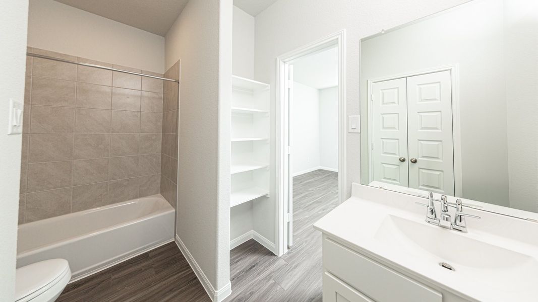 Representative furnished interior of a home built from the The Hawthorn by Legend Homes in Rocky Creek Crossing, Crowley (Image 5).