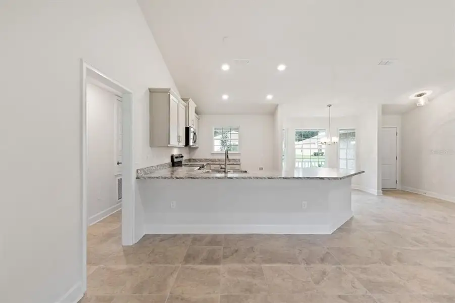 Representative furnished interior of a home built from the 1540 by Adams Homes in Okeechobee, Okeechobee (Image 4).