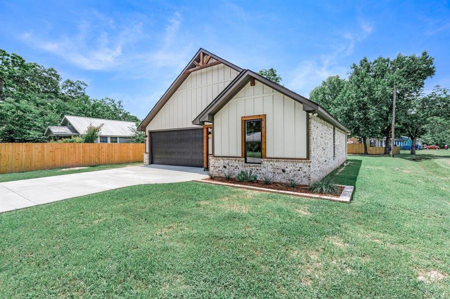 Front exterior of a new home in , Mineola, TX, highlighting curb appeal (Image 19).