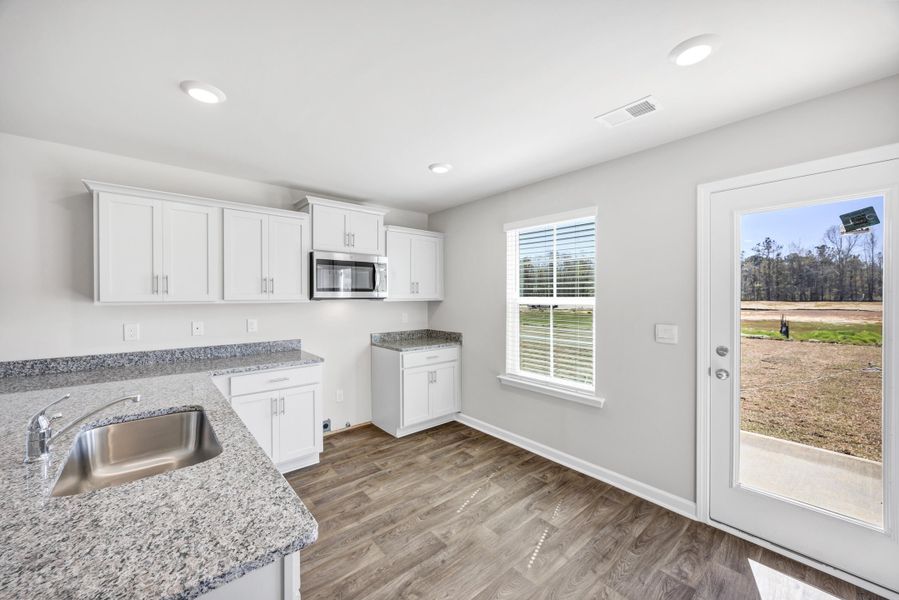 Furnished interior view inside a new home in The Park at Wilkinson, Orangeburg (Image 15). Furnished interior view inside a new home in The Park at Wilkinson, Orangeburg (Image 15).