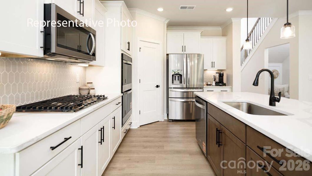 Furnished interior view inside a new home in Sylvan Creek, Denver (Image 31).