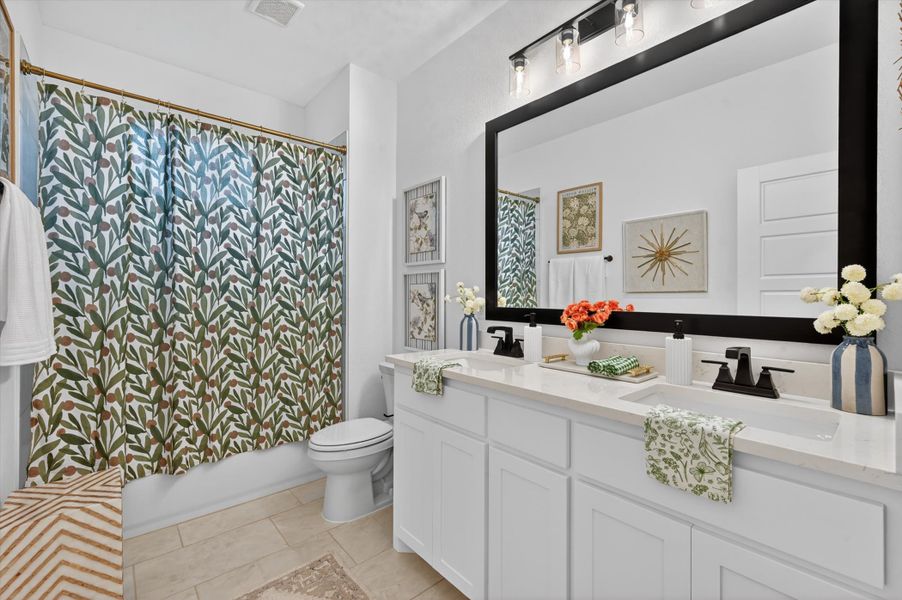 Representative furnished interior of a home built from the The Clover by Kenmark Homes in Zion Valley, Poolville (Image 14).