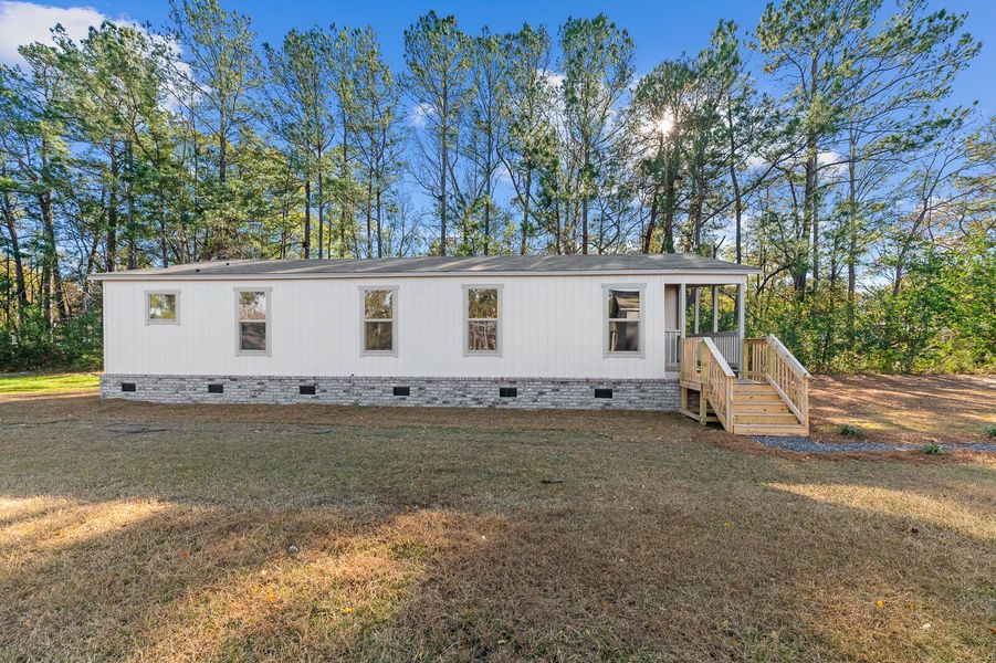 Exterior details and patio area of a home in , Moncks Corner (Image 17). Exterior details and patio area of a home in , Moncks Corner (Image 17).