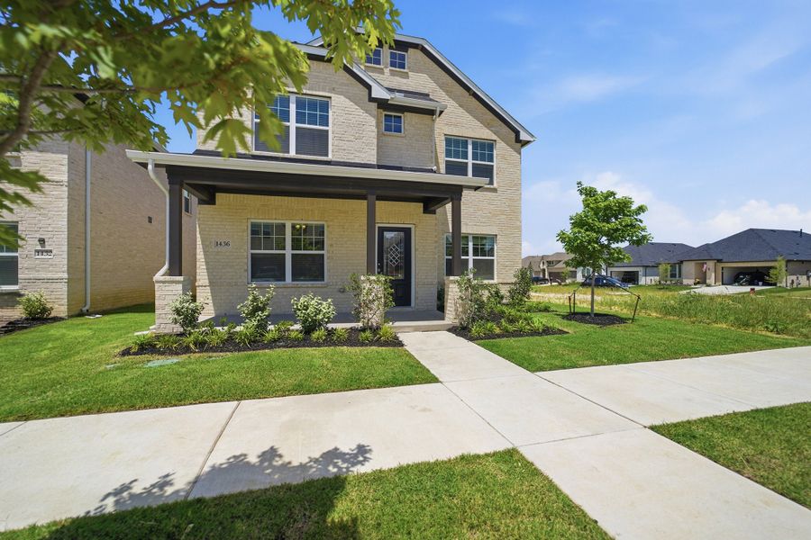 Front exterior of a new home in La Terra, Celina, TX, highlighting curb appeal (Image 21).