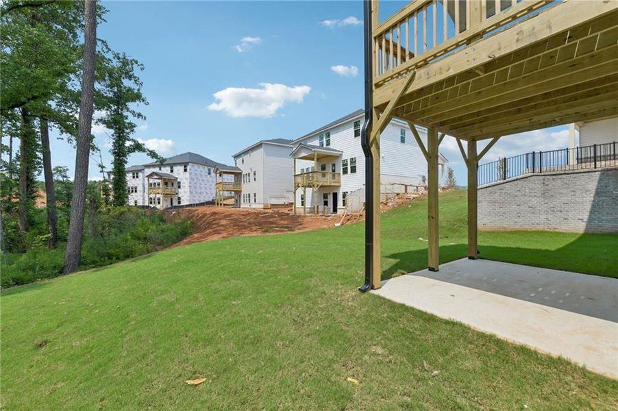 Exterior details and patio area of a home in Martin Springs - Estate Series, Lawrenceville (Image 26).