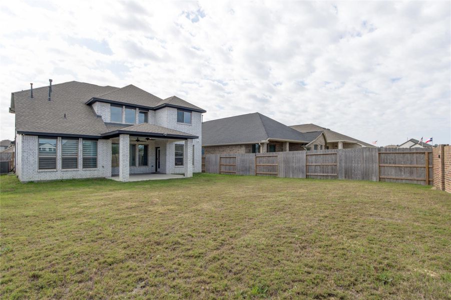 Exterior details and patio area of a home in , New Caney (Image 21). Exterior details and patio area of a home in , New Caney (Image 21).