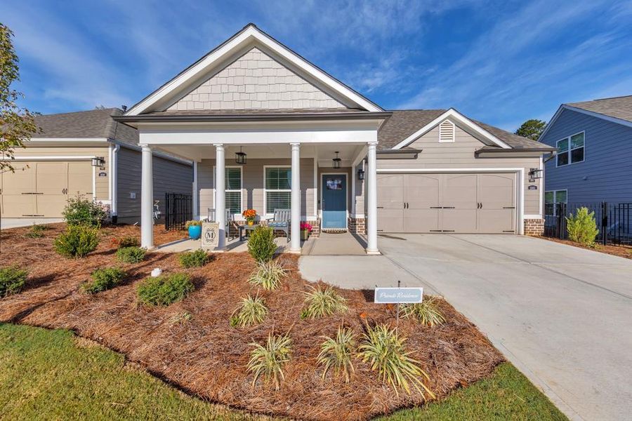 Exterior details and patio area of a home in Madeira, Acworth (Image 23).
