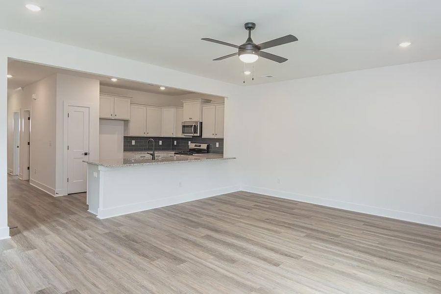 Representative unfurnished interior of a home built from the 1808 Townhome by Adams Homes in Parkstone Place Townhomes, Roebuck (Image 10). Representative unfurnished interior of a home built from the 1808 Townhome by Adams Homes in Parkstone Place Townhomes, Roebuck (Image 10).