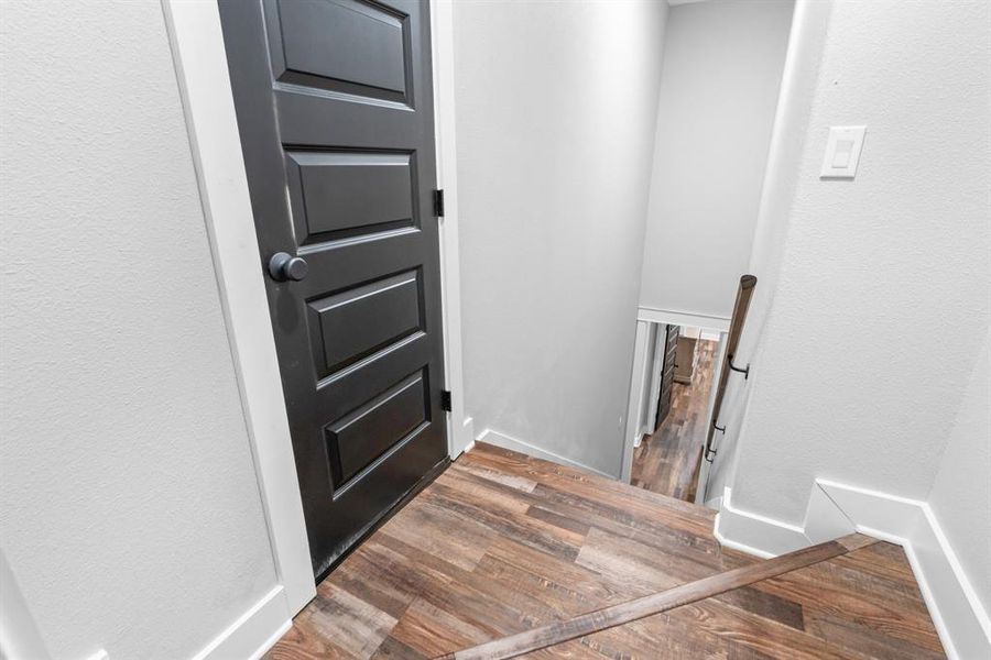 Stairs leading down from 4th Bedroom.  Attic access