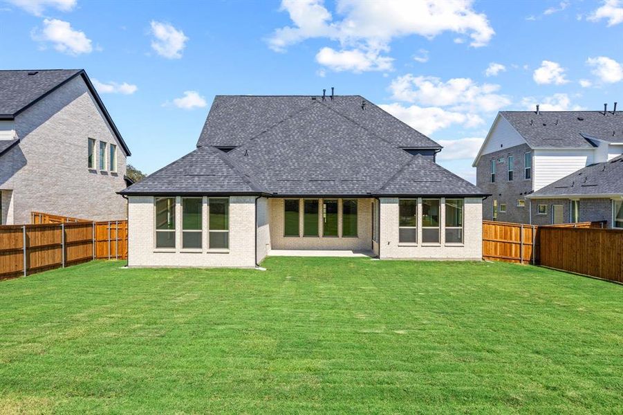 Exterior details and patio area of a home in Chatham Reserve, Providence Village (Image 2).