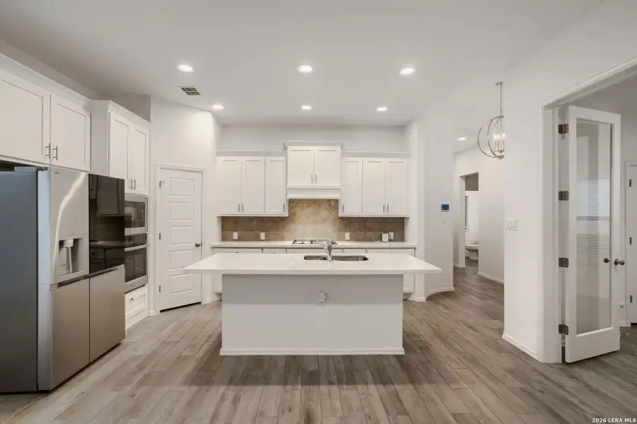 Furnished interior view inside a new home in Ladera, San Antonio (Image 7).